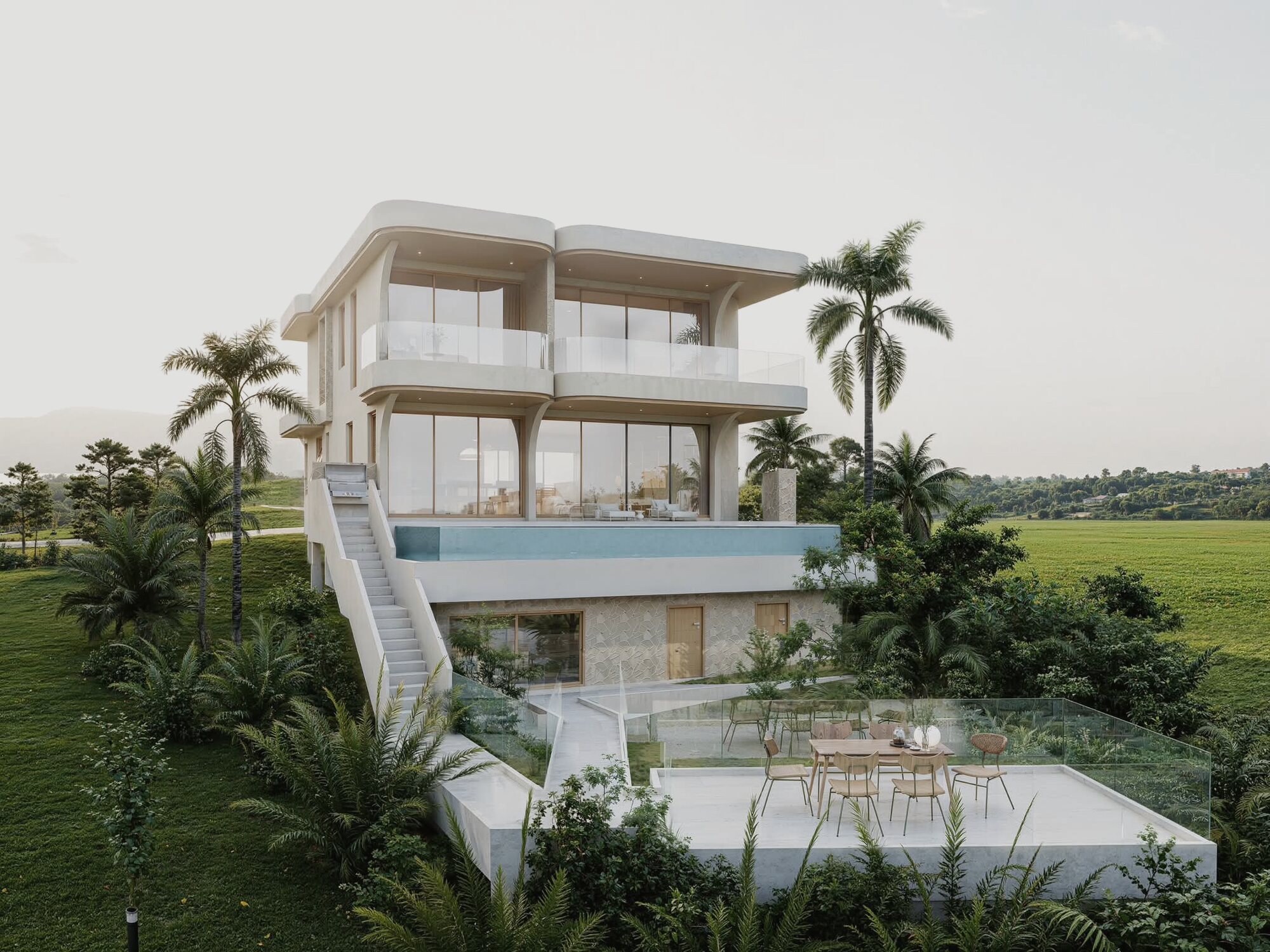 Rear elevation and pool of an Alaya villa at golden hour